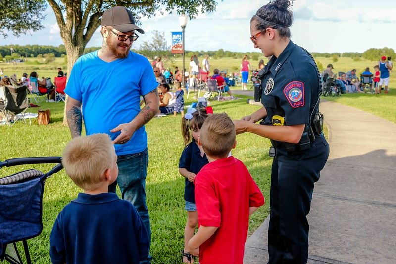 Police Officer Talking with Children