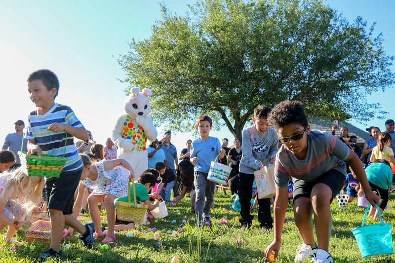 Children Racing to Gather Easter Eggs